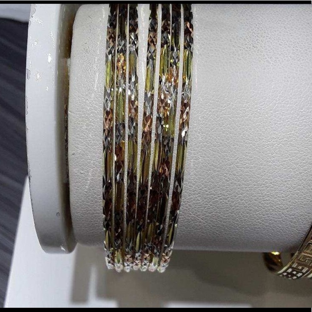 SET OF 7 14KT TRICOLOR BANGLES